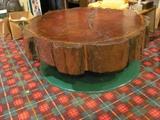 Redwood table with historic dates on brass markers identifying rings in tree