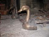 Solid brass duck andirons