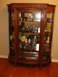 Antique Bow Front Glass Display Cabinet