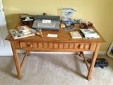 Beautiful Desk with Drop Down Drawer front for accessing Keyboard.  Can be Used as an Accent Foyer Table, or Other areas.  Quality Furnishings Throughout home.  Typewriter, Surge Protector and other office items.