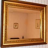 Gilded and smoke lined mirror, 19th century