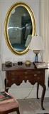 Reproduction lowboy, period oval gilded mirror
