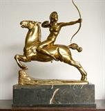 Lot 1038:  WAGNER, Eugene, (German, 1871-1942): Diana, The Huntress on a Magnificent Steed Aiming her Bow, Dore Bronze, 17'' h. x 16'' w. x 5 1/4'' d., incised signature to base, mounted on a multi piece marble plinth, overall height 23''h. x 18''w. x 7''d. Est. $800/1200**
CONDITION: There are several flea bites to the plinth but it is good overall.