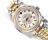 Lot 1111:  TONINO LAMBORGHINI DIAMOND BEZEL WRIST WATCH: Stainless steel and gold toned case, .33 ctw inset diamond bezel, metal dial with glow in the dark hands and hour markers, date window. Marked on face Tonino Lamborghini, Automatic, Swiss Made. Clear bezel back. Stainless steel and gold tone link band.
CONDITION: Scratches to band, currently running however not guaranteed to continue.