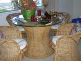 Glass top wicker table with 4 club chairs