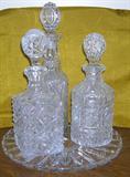 three crystal decaters
