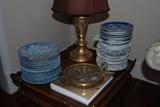 Royal Copenhagen Christmas Plates and French Christmas Plates w/Chippendale style tray on base end table with gilded lamp