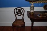 Four matching French chairs with fabulous chair backs in perfect condition