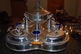 Silver plated lazy susan serving buffet with soup tureen and four serving dishes plus condiment bowls with spice shakers