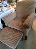 Upholstered arm chair and ottoman
