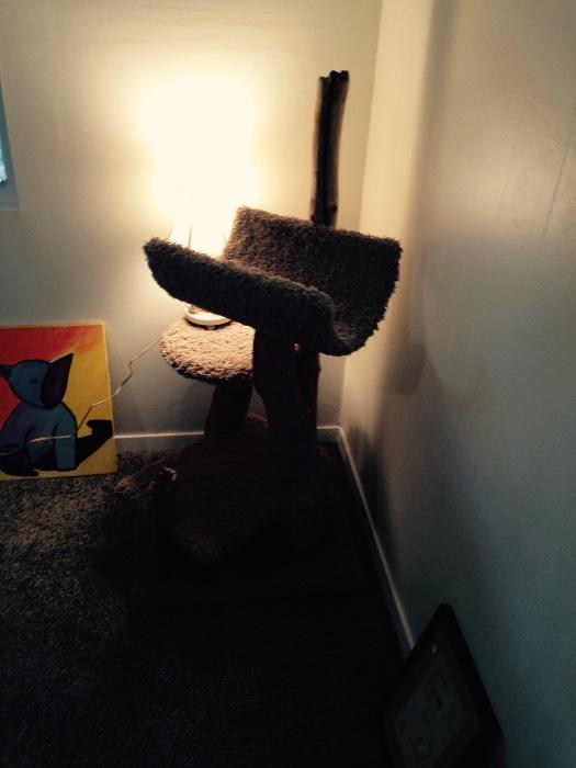 Authentic handmade cat stands staring at $75