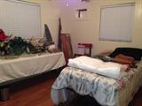 Many bedroom items , bed and furnishings