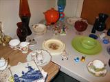 The orange piece in the background is genuine Fiesta Ware.