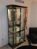 Lot #1  
 5 shelf chrome and gold toned trim glass display case measures 79 1/2" tall 39" wide 18" deep at base