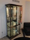 Lot #1  
 5 shelf chrome and gold toned trim glass display case measures 79 1/2" tall 39" wide 18" deep at base
