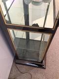 Lot #1 
5 shelf chrome and gold toned trim glass display case measures 79 1/2" tall 39" wide 18" deep at base

