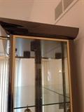Lot #1 
5 shelf chrome and gold toned trim glass display case measures 79 1/2" tall 39" wide 18" deep at base
