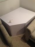 Lot #32 
White Formica end / corner table with push to open drawer left side when facing couch
