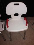 Lot #47 
Adjustable shower chair w hand rails
