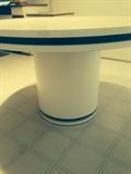 Lot #17 
Round white Formica kitchen table with black trim 48" diameter 30" tall  Table Only.