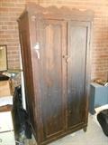 Square 2 door deep Carved Cedar Primitive Armoire.