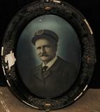 LARGE OVAL PHOTOGRAPHIC PICTURE OF RR CONDUCTOR 