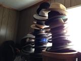 Very nice collection of men's hatwear with cardboard  and hard sided hatboxes