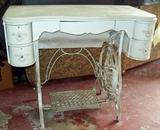 Antique sewing machine table.
