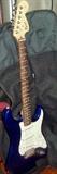 Fender Squire Strat electric guitar w. case.