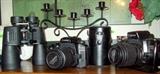 Canon cameras and Orion binoculars.