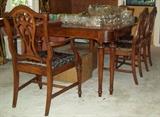 Dining room table plus 4 chairs (can be sold seperately).