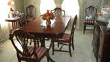 Mahogany table with fold down leaf & 6 chairs