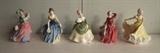 Royal Doulton Figurines include: Darling, Nanette, Blythe Morning, Rhapsody, Soiree, Autumn Breezes, Camellia, Melanie, Coralline, Simone, Pauline (reclining), Sheppard, Lambing Time, a Pig and a Retail shelf sign (Small Group Shown)