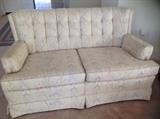 White loveseat and matching sofa