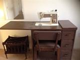 Singer sewing machine in original cabinet