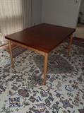 Danish Modern Dining Table 	

 Labeled made in Denmark. Faint water mark. Two leaves measure 21.5 each. Table 51X36X29. 	

	
http://auctionnearyou.maxsold.com/view-auctions/catalog/id/378/lot/40971/?url=%2Fview-auctions%2Fcatalog%2Fid%2F378%2F%3Fpage%3D1%26items%3D100
