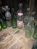 Coke, Pepsi, Royal Crown and Dr. Pepper bottles.  From the very early 1900's to the 1950's