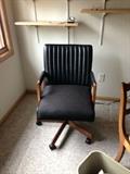 Vintage desk chair on castors.