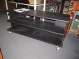 75.00 media stand with casters perfect for a room or Living room
