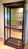 mahogany lighted display case, mirrored back, glass shelves, sliding locking front door