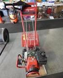 Troybilt Jr. tiller, 4.0 HP. Seller reports in working condition.