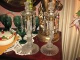 Pair of Baccarat Frosted Crystal Cherub Candle holders with Bo Beches with cut crystal prisms marked Baccarat on the bottom of each candle holder.