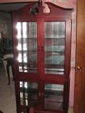 Davis Cabinet , Limited Edition , 2000, Cherry Beveled Glass Curio Cabinet with brass tag number 380/ of 451 that was produced.