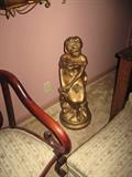 smaller figural statue.