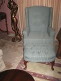 one of 2 Blue Arm chairs and ottoman.