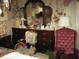 Dresser to 5 piece Lexington Cherry Sleigh Bedroom Suite with 2 Bombay Night stands and Armoire with King size bed. Bedding comforters to sell after bed set is sold.