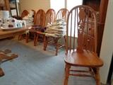 Ten (10), golden oak chairs with Texas star. 