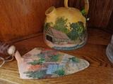 Hand painted spade and water pot.