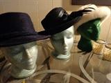 Vintage hats with heads.