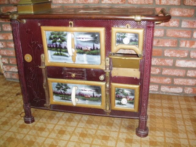 Circa 1900 Art Nouveau French Cook Stove! Hand-painted detailing!  Could be converted into a Kitchen Island and with Butcher Block top would be a wonderful addition to your home! 
